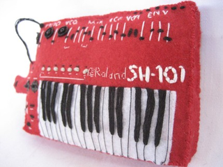 Illustration for article titled Miniature Synthesizer Replicas Cast in Felt Will Rock Your Tiny Mind